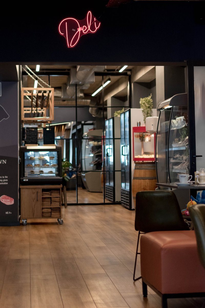 The entrance to Prime Wagyu beside the wine displays